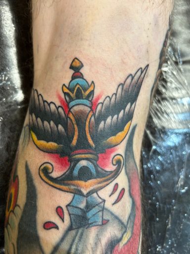 Sword Tattoo 
Wing Tattoo
Traditional Tattoo 
Reno Nevada
Seven Swans Tattoo
Color Traditional Tattoo